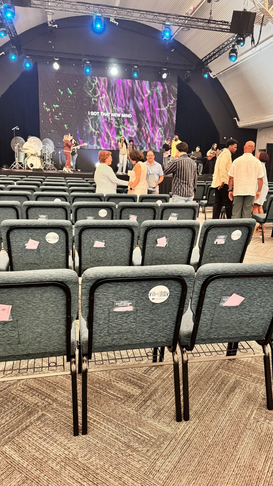 A church service during a fall generosity series where members use NFC tap to give plates